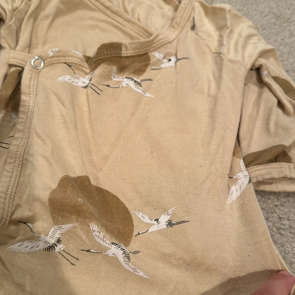 Kate Quinn bird bodysuit